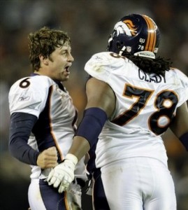 Jay Cutler and Ryan Clady (AP Photo)