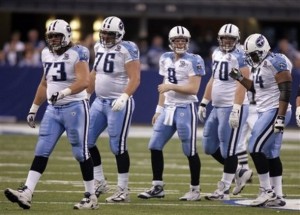 Chris Simms (8) and the offensive line of the Tennesse Titans. (AP Photo/Michael Conroy)