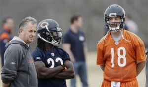 Bears OC Ron Turner, Devon Hester, and Kyle Orton in March 2009 (AP Photo/Charles Rex Arbogast)