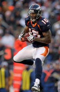 Wide receiver Brandon Marshall #15 of the Denver Broncos runs with the football during NFL action at Invesco Field at Mile High in 2008.  (Photo by Doug Pensinger/Getty Images)