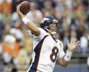 Denver Broncos' Kyle Orton throws down field in the second quarter of an NFL preseason football game against the Seattle Seahawks on Saturday, Aug. 22, 2009, in Seattle. (AP Photo/Elaine Thompson)