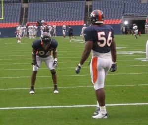 Jarvis Moss and Robert Ayers during Thursday's stadium practice.  (BroncoTalk/Kyle Montgomery)