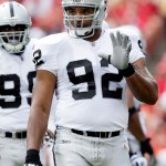 Defensive end Richard Seymour #92 of the Oakland Raiders gestures toward the sidelines during a timeout during the game against the Kansas City Chiefs at Arrowhead Stadium on September 20, 2009 in Kansas City, Missouri.  (Photo by Jamie Squire/Getty Images)