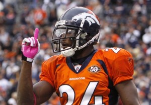 Denver Broncos cornerback Champ Bailey celebrates breaking up a pass by the Dallas Cowboys in the final seconds of the fourth quarter of their NFL football game in Denver October 4, 2009.  (REUTERS/Rick Wilking)