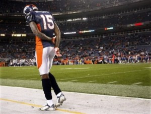 Denver Broncos' Brandon Marshall (15) walks along the sideline during the closing minutes of an NFL football game against the San Diego Chargers, Sunday, Nov. 22, 2009, in Denver. The Chargers defeated the Broncos 32-3. (AP Photo/Jack Dempsey)