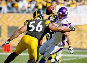 Brett Favre #4 of the Minnesota Vikings is trapped by LaMarr Woodley #56 and James Harrison #92 of the Pittsburgh Steelers at Heinz Field on October 25, 2009 in Pittsburgh, Pennsylvania.  (Rick Stewart/Getty Images)