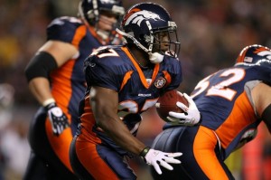 Running back Knowshon Moreno #27 of the Denver Broncos rushes against the New York Giants during NFL action at Invesco Field at Mile High on November 26, 2009 in Denver, Colorado.  (Doug Pensinger/Getty Images)