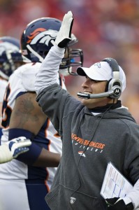 Head Coach Josh McDaniels  of the Denver Broncos celebrates with his players after a touchdown against the Kansas City Chiefs on December 6, 2009 in Kansas City, Missouri.   The Broncos defeated the Chiefs 44-13.   (Wesley Hitt/Getty Images)