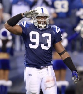 In this Dec. 13, 2009, photo, Indianapolis Colts defensive end Dwight Freeney gestures during an NFL football game between the Colts and the Denver Broncos in Indianapolis. (AP Photo/Darron Cummings)