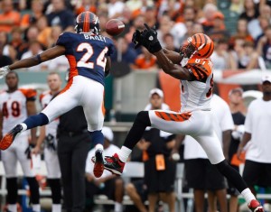Champ Bailey knocks away a pass intended for Terrell Owens. (Photo by Joe Robbins/Getty Images)
