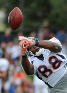 Denver Broncos rookie wide receiver Demarius Thomas misses a pass during the afternoon session of the first day of NFL football training camp at Broncos headquarters in Englewood, Colo., Sunday, Aug. 1, 2010. (AP Photo/Jack Dempsey)