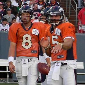 Denver Broncos quarterbacks Kyle Orton and Tim Tebow split reps -- and cheers -- Saturday night in front of a record crowd at INVESCO Field at Mile High (BroncoTalk.net)