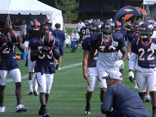 Denver Broncos defensive backs Nate Jones (33), Perrish Cox (32) and Alphonso Smith (22) run drills in training camp on Wednesday, August 4, 2010 (BroncoTalk.net).