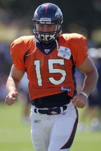 Rookie quarterback Tim Tebow #15 of the Denver Broncos leaves the field and heads for the locker room during the early sessions of practice at Dove Valley on August 18, 2010 in Englewood, Colorado.  (Doug Pensinger/Getty Images)