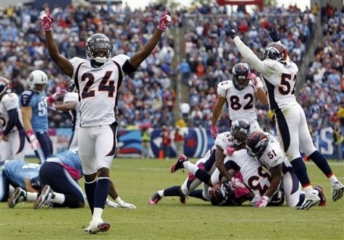 Champ Bailey and Jason Hunter celebrate after they recovered a muffed Tennessee Titans kickoff. (AP Photo/Mark Humphrey)