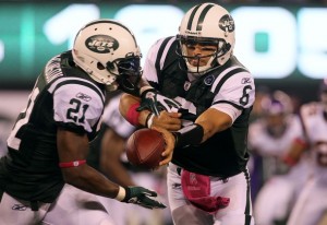 Quarterback Mark Sanchez #6 of the New York Jets hands the ball off to LaDainian Tomlinson #21 against the Minnesota Vikings at New Meadowlands Stadium on October 11, 2010 in East Rutherford, New Jersey.  (Jim McIsaac/Getty Images)