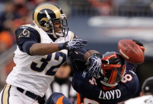 Corner back Bradley Fletcher #32 of the St. Louis Rams breaks up a pass intended for wide receiver Brandon Lloyd #84 of the Denver Broncos in the second quarter at INVESCO Field at Mile High on November 28, 2010 in Denver, Colorado. (Justin Edmonds/Getty Images)