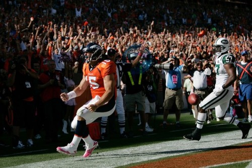 Tim Tebow celebrates his touchdown run against the New York Jets. (Photo by Justin Edmonds/Getty Images)