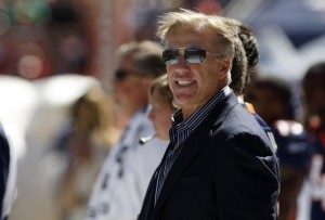 Former Denver Broncos quarterback great John Elway waits on the sidelines before the Broncos play against the Seattle Seahawks in their NFL football game in Denver September 19, 2010. (REUTERS/Rick Wilking)