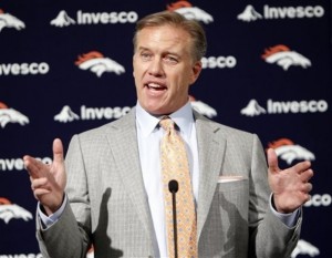 Hall of Fame quarterback John Elway speaks during an NFL football news conference at the Denver Broncos' headquarters Wednesday, Jan. 5, 2011, in Englewood, Colo., where he was named the team's executive vice president of football operations. (AP Photo/ Ed Andrieski)