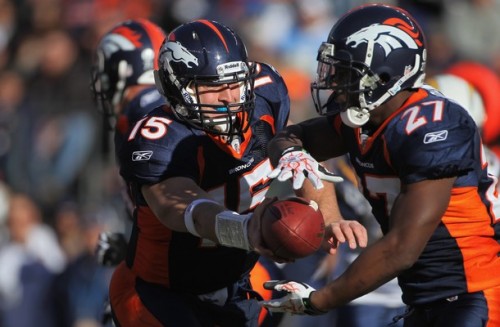 Quarterback Tim Tebow #15 of the Denver Broncos hands the ball off to running back Knowshon Moreno #27 against the San Diego Chargers at INVESCO Field at Mile High on January 2, 2011 in Denver, Colorado.  (Doug Pensinger/Getty Images)