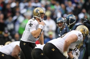 Drew Brees #9 of the New Orleans Saints calls a play against the Seattle Seahawks during the 2011 NFC wild-card playoff game at Qwest Field on January 8, 2011 in Seattle, Washington.  (Jonathan Ferrey/Getty Images)