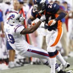 Denver Broncos safety Rahim Moore (R) throws Buffalo Bills wide receiver Donald Jones to the ground after an incomplete pass to Jones during their pre-season NFL football game in Denver August 20, 2011. Moore was penalized for unsportsmanlike conduct on the play.  (REUTERS/Rick Wilking)