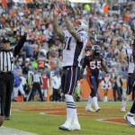 New England Patriots tight end Aaron Hernandez (81) reacts after catching a pass for a touchdown against the Denver Broncos in the second quarter of an NFL football game, Sunday, Dec. 18, 2011, in Denver. (AP Photo/Jack Dempsey)