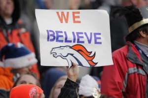 A fan holds up a sign in support of the Denver Broncos against the Kansas City Chiefs at Sports Authority Field at Mile High on January 1, 2012 in Denver, Colorado. The Chiefs defeated the Broncos 7-3 as the Broncos advanced to the AFC playoffs.  (Doug Pensinger/Getty Images)