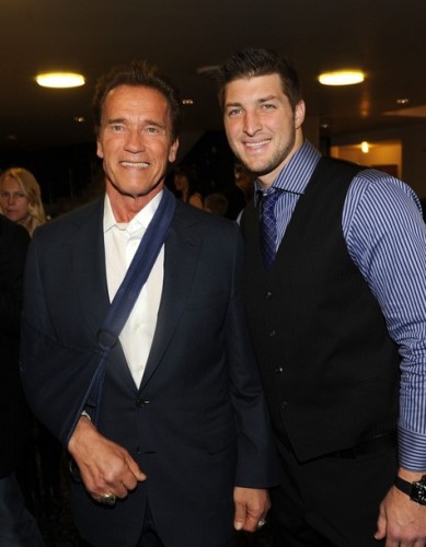 Arnold Schwarzenegger and Tim Tebow