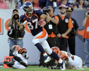 Denver Broncos Eric Decker runs for a touchdown untouched against the Cincinnati Bengals during their NFL football game in Denver, Colorado
