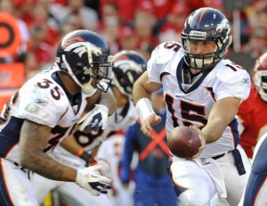 Denver Broncos quarterback Tim Tebow (R) hands off to running back Lance Ball during the second half of the Bronco's win over the Kansas City Chiefs in their NFL football game at Arrowhead Stadium in Kansas City, Missouri  November 13, 2011. REUTERS/Dave Kaup