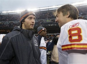 Injured Chicago Bears quarterback Jay Cutler talks with Kansas City Chiefs quarterback Kyle Orton (8) after the Chiefs' 10-3 win in an NFL football game in Chicago, Sunday, Dec. 4, 2011. (AP Photo/Nam Y. Huh)