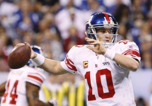 New York Giants quarterback Eli Manning throws for the first down in the NFL Super Bowl XLVI football game against the New England Patriots in Indianapolis, Indiana, February 5, 2012. (Matt Sullivan/Reuters)