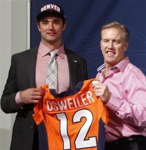 Denver Broncos vice president John Elway, right,  poses with Brock Osweiler the teams second draft pick in the 2012 NFL football draft at the Denver Broncos headquarters in Englewood, Colo., on Saturday, April 28, 2012. Osweiler was a quarterback at Arizona State. (AP Photo/Ed Andrieski)